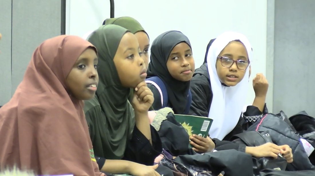 Young students engaged in a mentoring circle